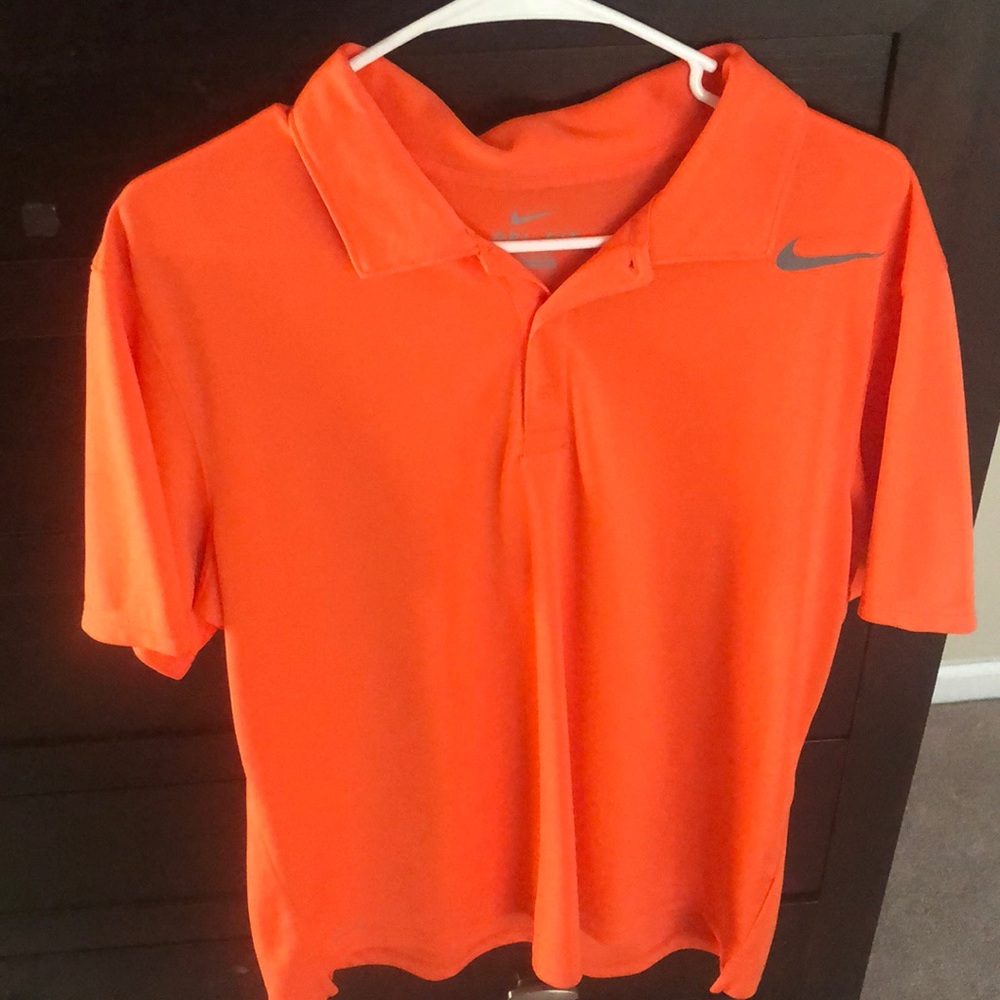 Orange Nike golf polo